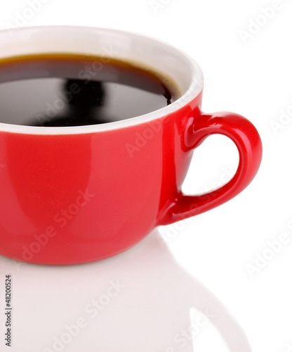 Photo: A red cup of strong coffee isolated on white A red cup of strong coffee isolated on white