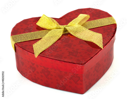 Photo: Heart shaped Valentines Day gift box on white background Heart shaped Valentines Day gift box on white background