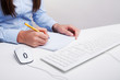 Woman writes in the notebook