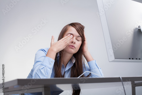 Photo: Woman tired at work Woman tired at work
