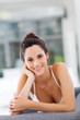 attractive young woman relaxing on sofa at home