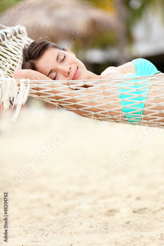 Photo: Beach lifestyle woman in hammock Beach lifestyle woman in hammock