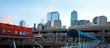 Seattle waterfront near aquarium with marina and boats.
