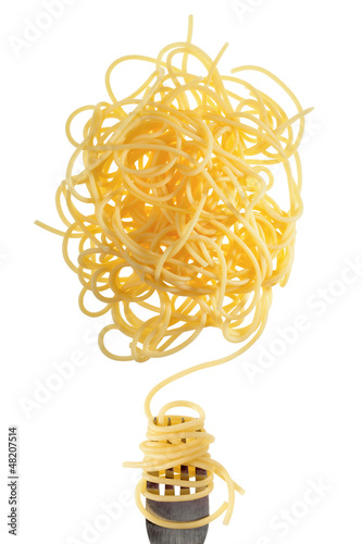 Photo: Swirls of cooked spaghetti with fork Swirls of cooked spaghetti with fork