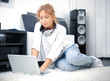 Woman sitting on the floor