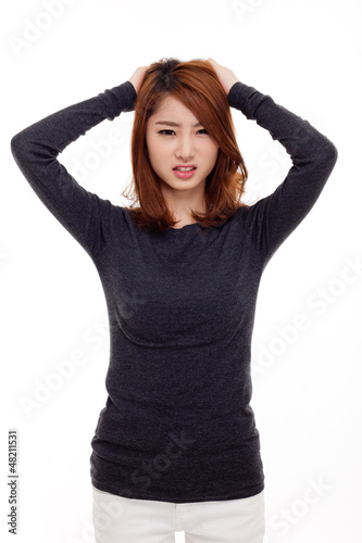 Photo: Asian woman having stress isolated on white background. Asian woman having stress isolated on white background.