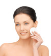 beautiful woman with cotton pad