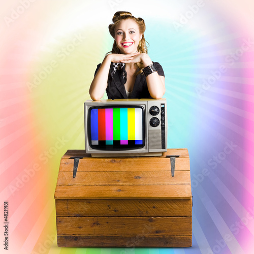 Photo: Technology Smart Pinup Woman On Retro Color TV Technology Smart Pinup Woman On Retro Color TV