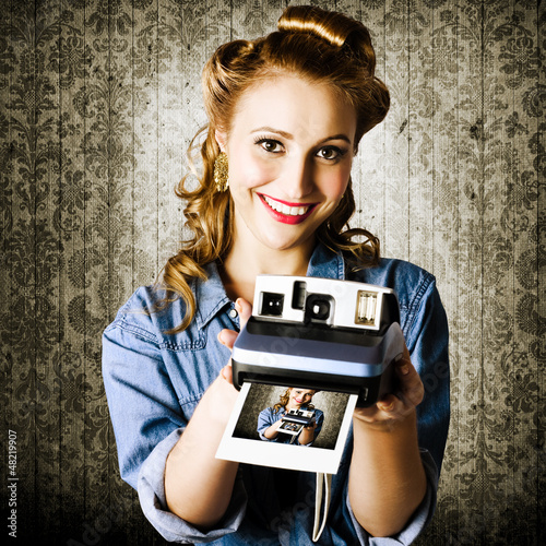 Photo: Smiling Young Vintage Girl Taking Polaroid Photo Smiling Young Vintage Girl Taking Polaroid Photo