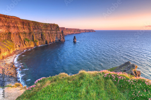 Photo: Cliffs of Moher at sunset in Co. Clare, Ireland Cliffs of Moher at sunset in Co. Clare, Ireland