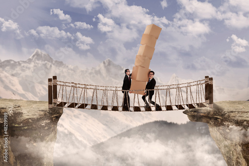 Photo: Business teamwork on bridge outdoor Business teamwork on bridge outdoor