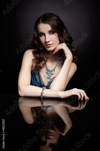 Photo: brunette woman and mirror brunette woman and mirror