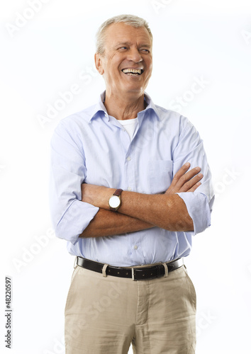 Photo: Portrait Of A Senior Businessman Smiling Portrait Of A Senior Businessman Smiling