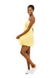 Beautiful African American Woman dancing yellow dress isolated o