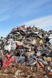 Heap of metal for recycling with blue sky