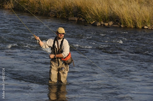Photo: flyfishing for trout Umzimkulu river, Underberg, Natal. flyfishing for trout Umzimkulu river, Underberg, Natal.