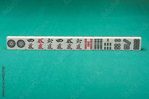 Photo: Smooth table surface with a mahjong on it Smooth table surface with a mahjong on it
