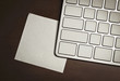 blank keyboard and note