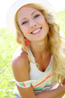 Beautiful blond girl in countryside