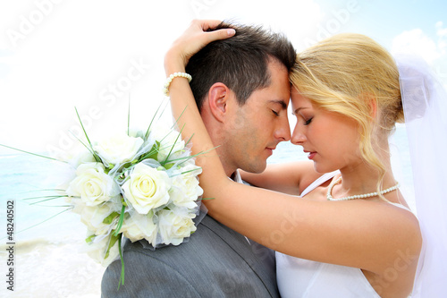 Photo: Just married couple sharing romantic moment Just married couple sharing romantic moment