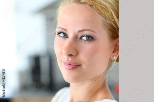 Photo: Attractive woman smiling at camera Attractive woman smiling at camera