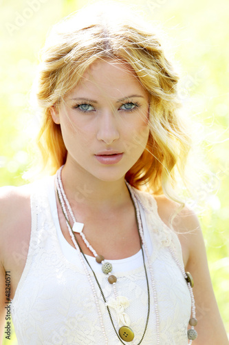 Photo: Portrait of attractive woman in countryside Portrait of attractive woman in countryside