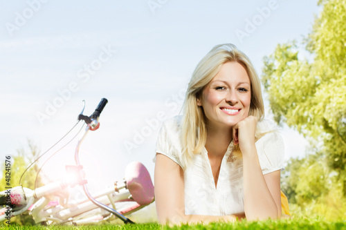 Photo: happy young woman relaxing happy young woman relaxing