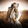 Photo: Young Female Photographer With Vintage Camera Young Female Photographer With Vintage Camera