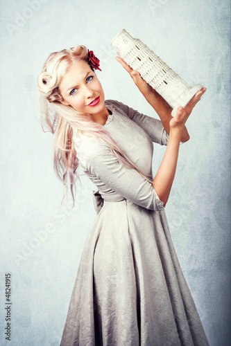 Photo: Elegant European Woman Holding Holiday Landmark Elegant European Woman Holding Holiday Landmark