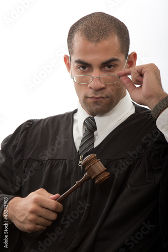 Photo: Young african american judge holding gavel Young african american judge holding gavel