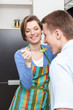 Woman offers her husband to taste salad