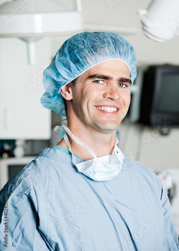 Photo: Cheerful Male Surgeon In Operating Room Cheerful Male Surgeon In Operating Room