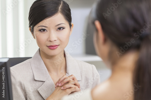 Photo: Asian Chinese Woman or Businesswoman in Meeting Asian Chinese Woman or Businesswoman in Meeting
