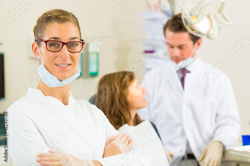 Photo: Dentist in her surgery Dentist in her surgery