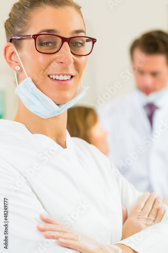 Photo: Dentist in her surgery Dentist in her surgery