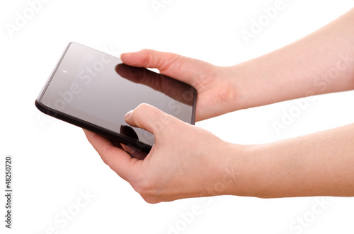 Photo: Zwei Hände halten ein computer tablet Zwei Hände halten ein computer tablet