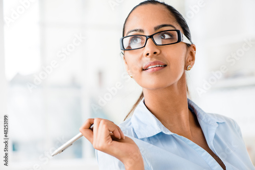 Photo: Indian business woman thinking future Indian business woman thinking future