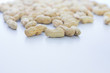 tasty peanuts with leaves, isolated on white