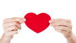 Two arms holding red fabric heart. Valentine's day or medical se