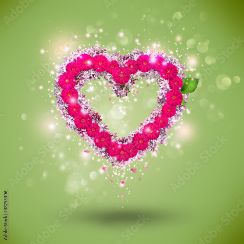 Photo: Valentine background: single heart made of flowers Valentine background: single heart made of flowers