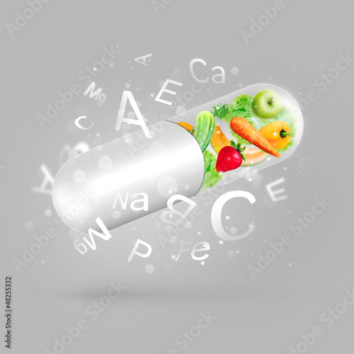 Photo: Different fruit and vegetables in capsule - healthy diet or natu Different fruit and vegetables in capsule - healthy diet or natu