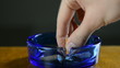 Video: Putting out a cigarette. Hand puts out a cigarette in an ashtray Putting out a cigarette. Hand puts out a cigarette in an ashtray