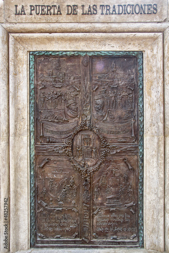 Photo: old wooden door in front of a house old wooden door in front of a house