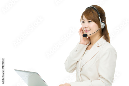 Photo: Beautiful asian business operator on white background Beautiful asian business operator on white background