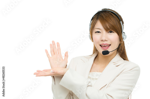 Photo: Beautiful asian business operator on white background Beautiful asian business operator on white background