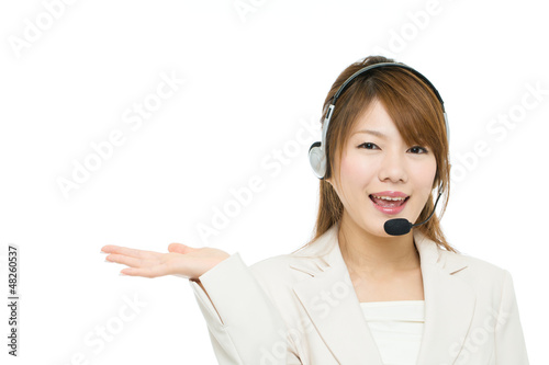 Photo: Beautiful asian business operator on white background Beautiful asian business operator on white background