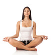 Photo: Young woman sitting in lotus position Young woman sitting in lotus position
