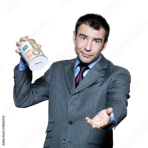 Photo: Portrait of sad businessman holding empty money box Portrait of sad businessman holding empty money box
