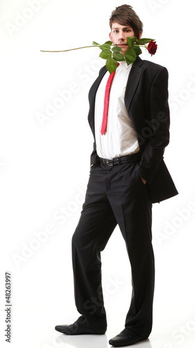 Photo: Young man, flower, red rose isolated Young man, flower, red rose isolated