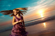 Photo: Girl jumping and dancing on beautiful beach. Girl jumping and dancing on beautiful beach.